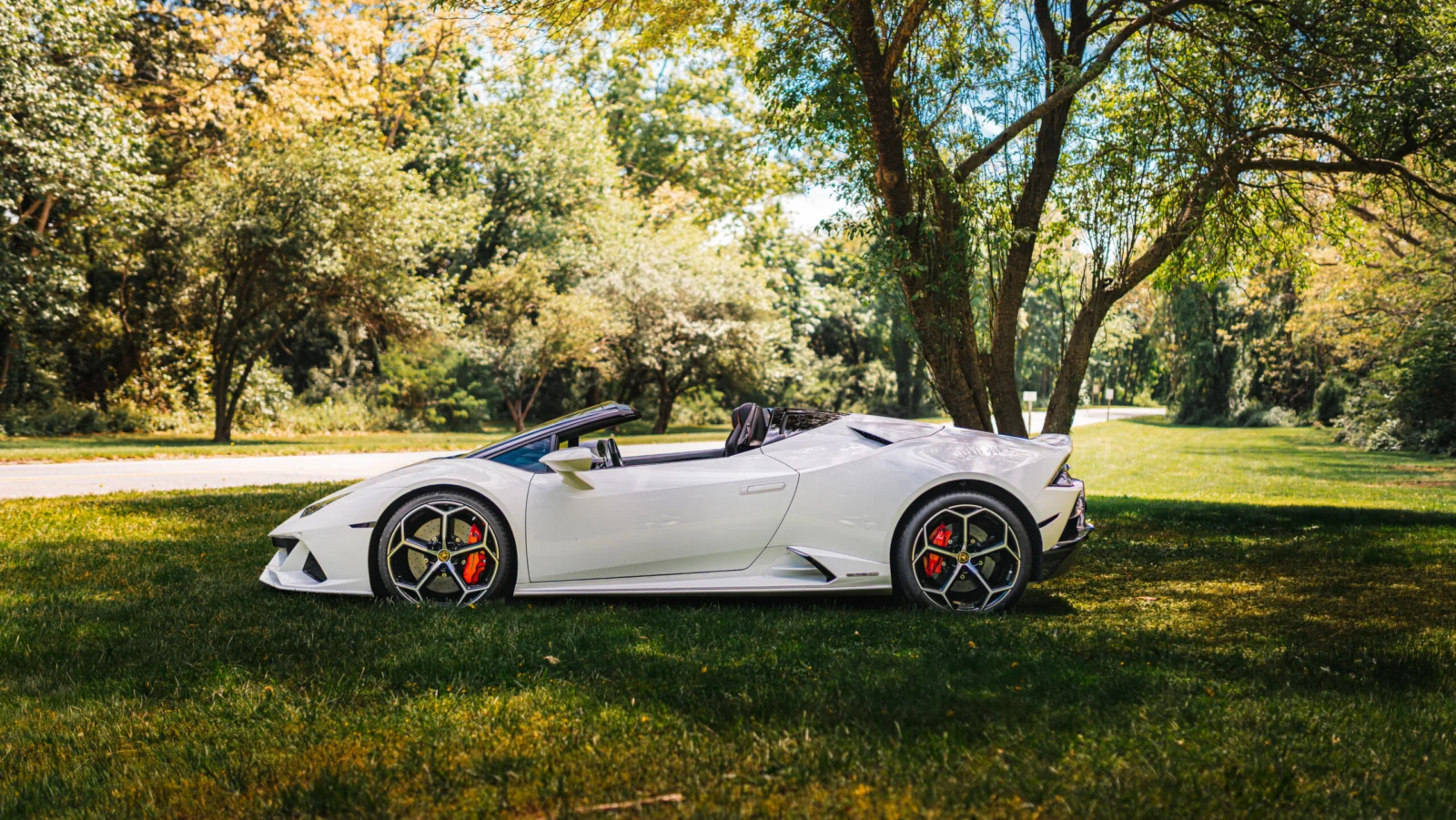 White Lamborghini Huracan EVO Spyder photographed outdoors for Monarq Motors